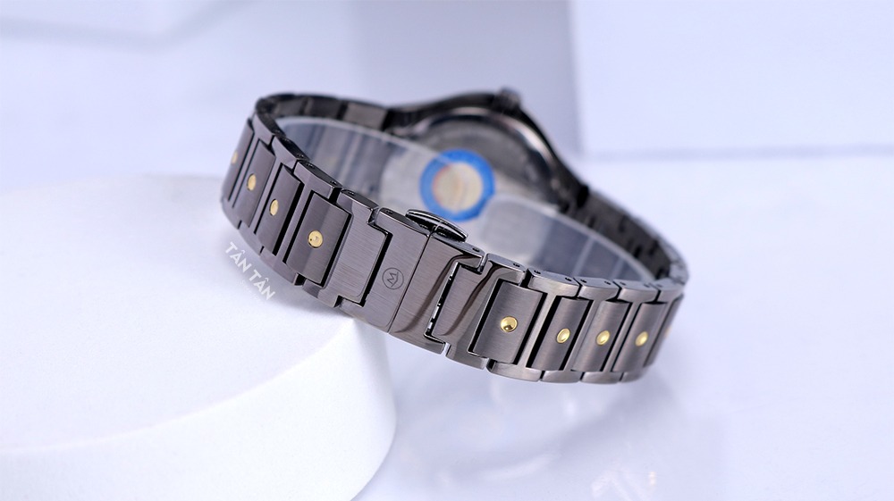 Đồng hồ Movado 0607542 - Dây đeo thiết kế H-link màu đen xám được điểm xuyết bơi các chấm tròn vàng gold