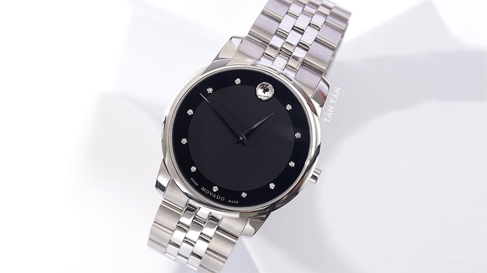 Đồng hồ Movado 0606878 - Mặt số màu đen hai lòng với 11 viên kim cương sang trọng của Movado 0606878