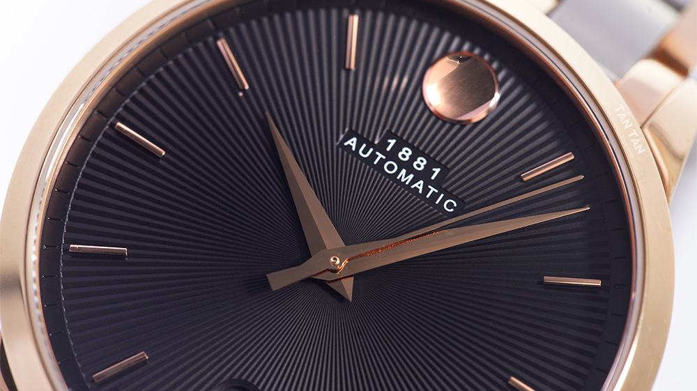 Đồng hồ Movado 0607464 - Bộ kim và chấm tròn đặc trưng được mạ vàng hồng nổi bật của Movado 0607464