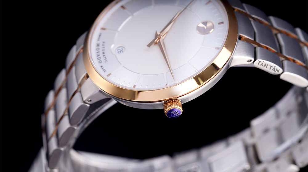 Đồng hồ Movado 0607063 - Niềng bezel cố định và núm chỉnh giờ được mạ vàng hồng